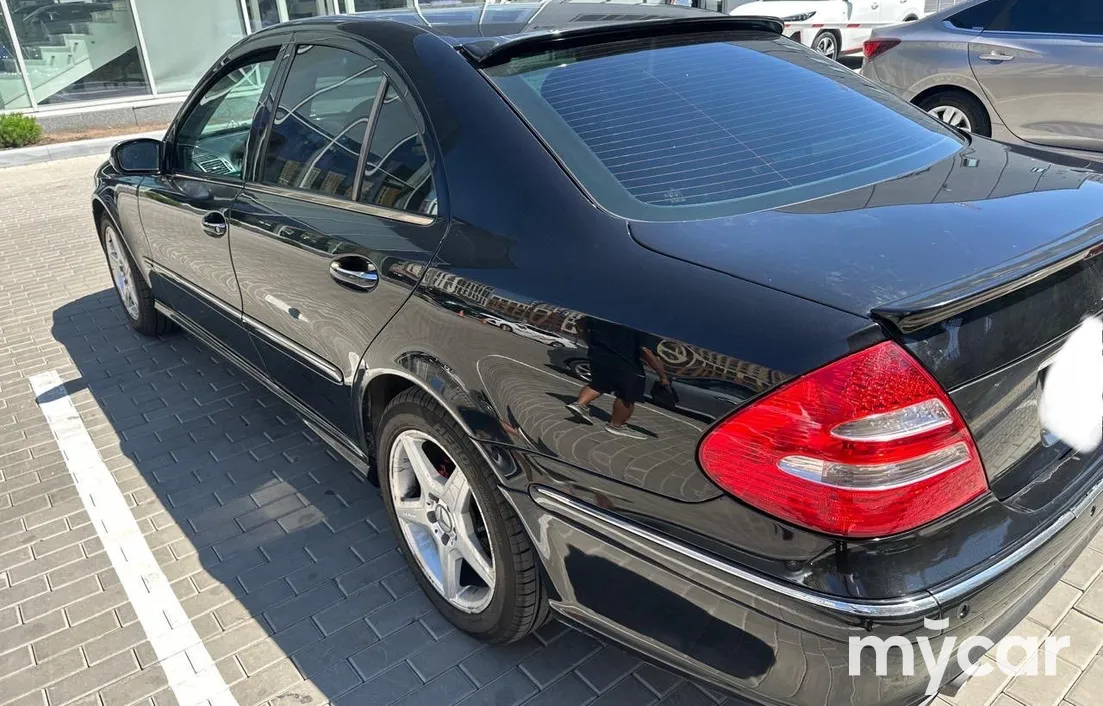 Mercedes-Benz E-Класс 2003