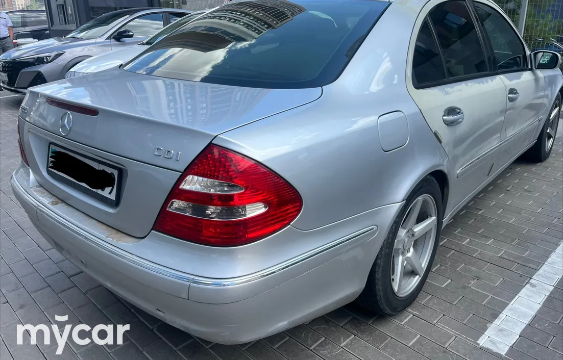 Mercedes-Benz E-Класс 2003
